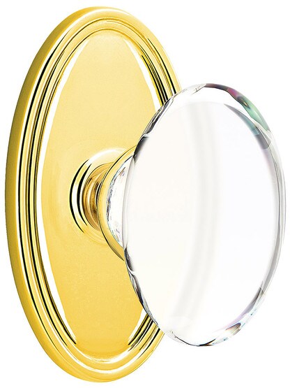 Oval Rosette Door Set With Hampton Crystal Knobs in Polished Brass.